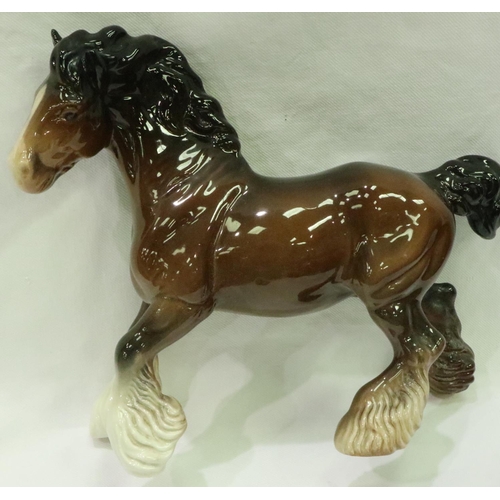 211 - Three large Beswick ceramic shire horses, various poses, largest L: 30 cm. P&P Group 3 (£25+VAT for ... 