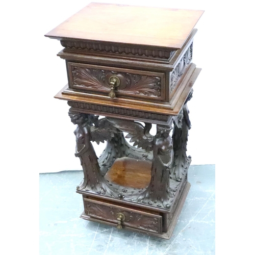 3106 - An unusual 19th century heavily carved two drawer lamp table, with supports in the form of four ange... 