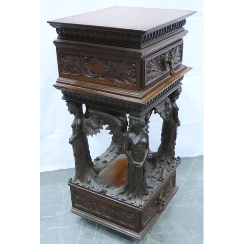 3106 - An unusual 19th century heavily carved two drawer lamp table, with supports in the form of four ange... 