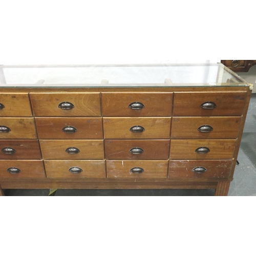 3107 - A mid 20th century haberdashery counter, having sixteen graduated drawers, by shop fittings Manchest... 