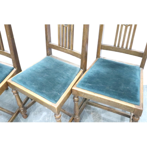 3112 - A set of four oak framed dining chairs with upholstered drop in seats. Not available for in-house P&... 