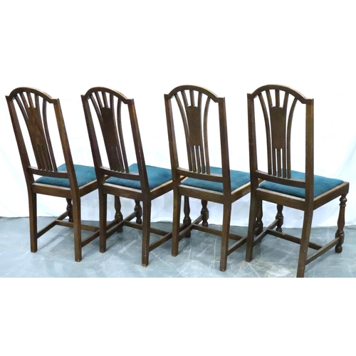 3112 - A set of four oak framed dining chairs with upholstered drop in seats. Not available for in-house P&... 