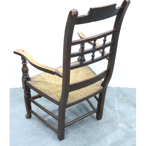 3113 - An 18th century oak rush seated elbow chair. Not available for in-house P&P, contact Paul O'Hea at M... 