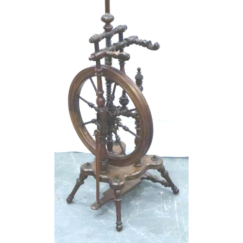 3116 - An early 19th century European fruitwood tredle spinning wheel of small proportions with turned and ... 