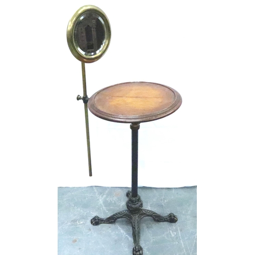 3117 - An Edwardian gentlemans wash stand, having an adjustable brass shaving mirror, circular oak stand an... 