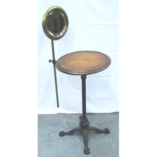 3117 - An Edwardian gentlemans wash stand, having an adjustable brass shaving mirror, circular oak stand an... 