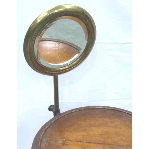 3117 - An Edwardian gentlemans wash stand, having an adjustable brass shaving mirror, circular oak stand an... 