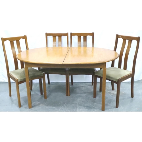 3120 - Meredew mid 20th century oval extending dining table with incorporated folding leaf and four chairs,... 