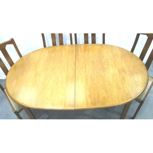 3120 - Meredew mid 20th century oval extending dining table with incorporated folding leaf and four chairs,... 