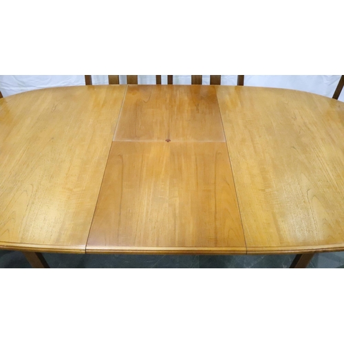 3120 - Meredew mid 20th century oval extending dining table with incorporated folding leaf and four chairs,... 