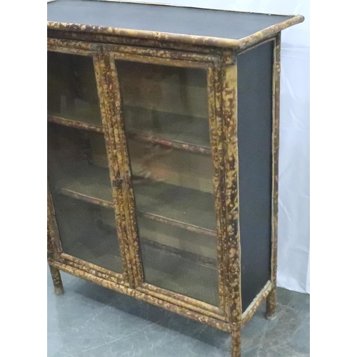 3121 - Bamboo and black glass fronted cabinet with internal shelves, 92 x 37 x 106 cm H. Bamboo has wrapped... 