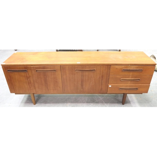 3122 - Mid 20th century teak sideboard, 199 x 45 x 73 cm H. Wear to top, lacking interior shelf to left cup... 