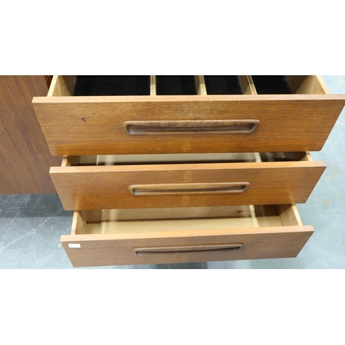 3122 - Mid 20th century teak sideboard, 199 x 45 x 73 cm H. Wear to top, lacking interior shelf to left cup... 