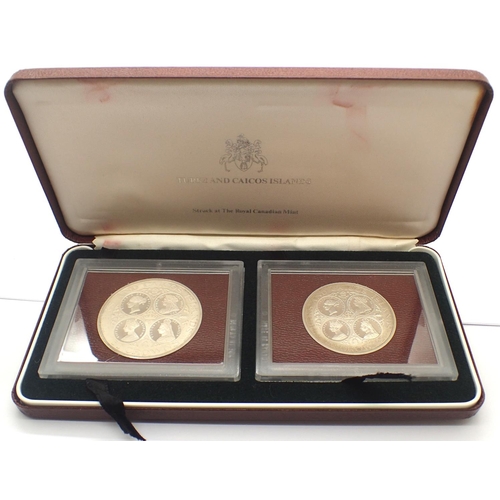 3112 - Turks & Caicos Islands cased two 20 crowns. P&P Group 0 (£5+VAT for the first lot and £1+VAT for sub... 