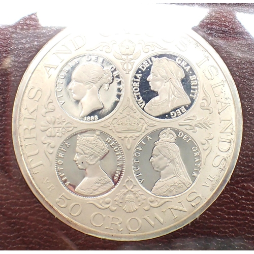 3112 - Turks & Caicos Islands cased two 20 crowns. P&P Group 0 (£5+VAT for the first lot and £1+VAT for sub... 