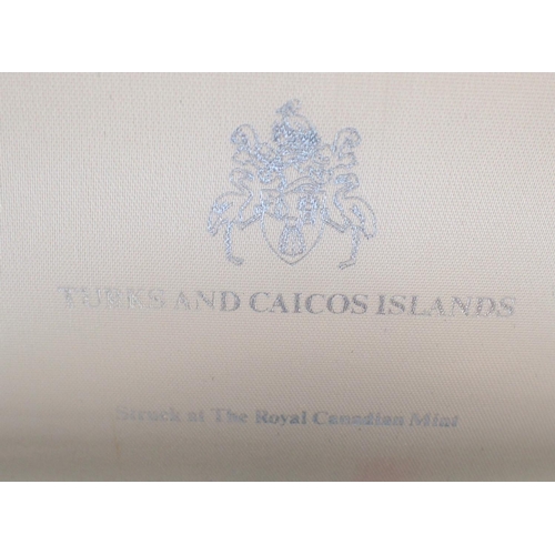 3113 - Turks and Caicos Islands cased two 20 crowns. P&P Group 0 (£5+VAT for the first lot and £1+VAT for s... 