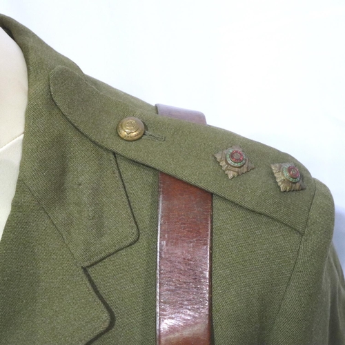 2071 - Royal Engineers British WWII uniform tunic with leather Sam Browne belt. Tunic pocket has a 1940s Mo... 