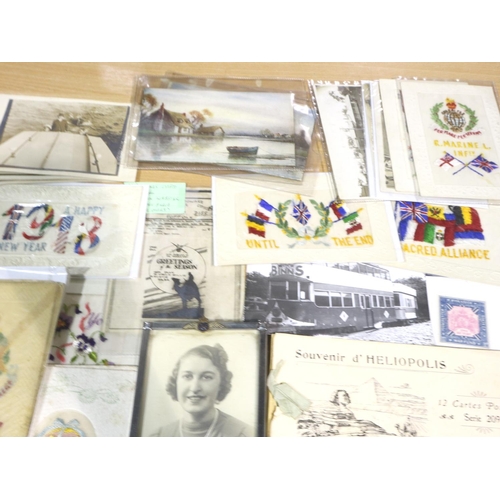 2082 - A collection of WWI and later photographs, postcards and further ephemera, including a 1915 dated Ge... 