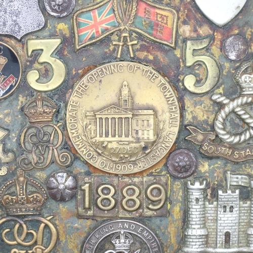 2095 - WWI memorial plaque formed from mixed regimental badges, buttons etc. P&P Group 2 (£18+VAT for the f... 