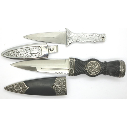 2186 - Two modern daggers one with bejewelled handle. P&P Group 2 (£18+VAT for the first lot and £3+VAT for... 