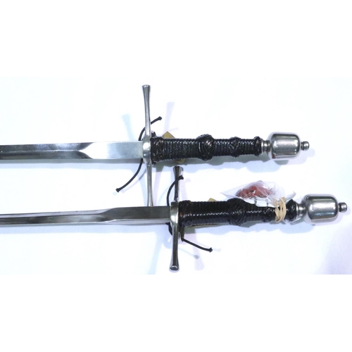 2283 - Two matching 16th - 17th century foils having bound leather hilts with Turks Head knot grip, steel c... 