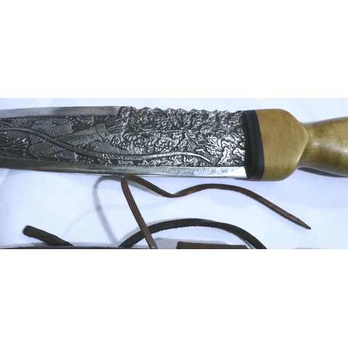 2292 - An Archers dagger/dirk having a fully engraved and etched blade with archery and hunting scenes and ... 