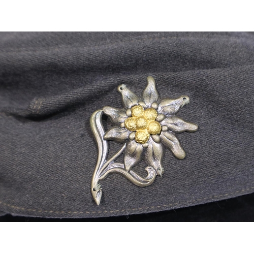 2156 - German WWII M43 field cap with Edelweiss badge. P&P Group 2 (£18+VAT for the first lot and £3+VAT fo... 