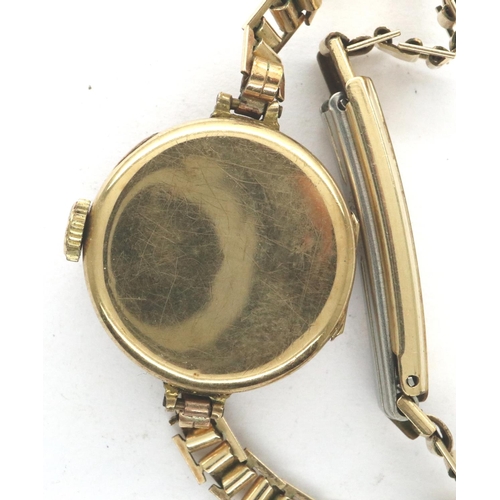 213 - 9ct gold cased ladies Swiss manual wind wristwatch on a rolled gold bracelet, working at lotting. P&... 