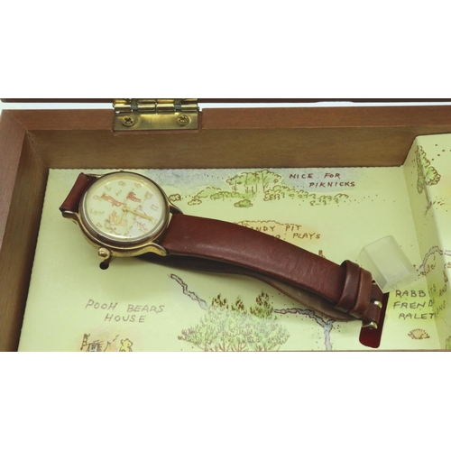 221 - Disney Winnie The Pooh timepiece and music box. P&P Group 1 (£14+VAT for the first lot and £1+VAT fo... 