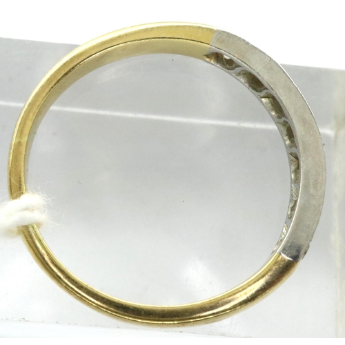 36 - 18ct gold ring set with set with seven diamonds, size O, 3.1g. P&P Group 1 (£14+VAT for the first lo... 