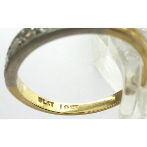 36 - 18ct gold ring set with set with seven diamonds, size O, 3.1g. P&P Group 1 (£14+VAT for the first lo... 