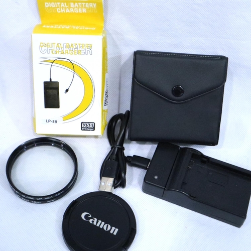 402 - Canon EOS 550D digital camera with ultrasonic 22-55mm lens, new charger, battery and two macro lense... 