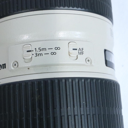 403 - Cased Canon zoom lens EF 70-200 mm with extender EF 1-4 x 11 and a Canon 430EX11 flash Speedlite. P&... 