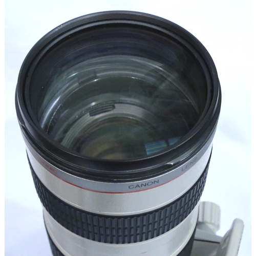 403 - Cased Canon zoom lens EF 70-200 mm with extender EF 1-4 x 11 and a Canon 430EX11 flash Speedlite. P&... 