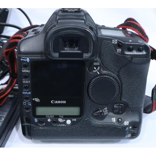 410 - Cased Canon EOS-1D digital camera with accessories and original box. P&P Group 1 (£14+VAT for the fi... 