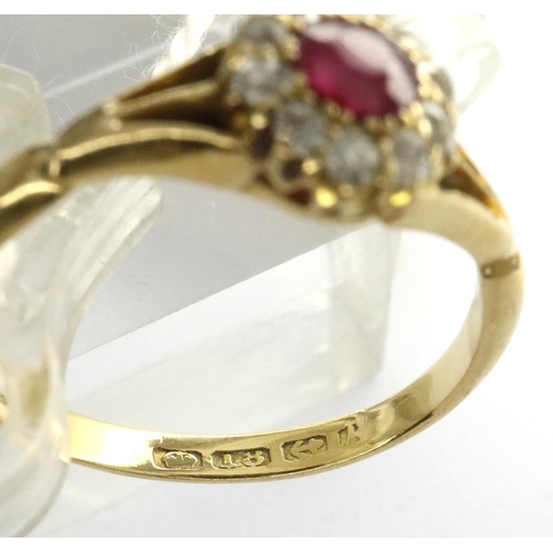 46 - 18ct gold ruby and diamond ring, size L, 2.2g. P&P Group 1 (£14+VAT for the first lot and £1+VAT for... 