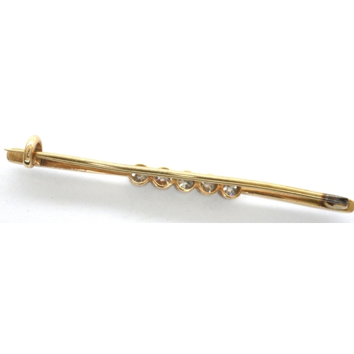 69 - Presumed 9ct gold bar brooch set with five diamonds, 3.2g. P&P Group 1 (£14+VAT for the first lot an... 