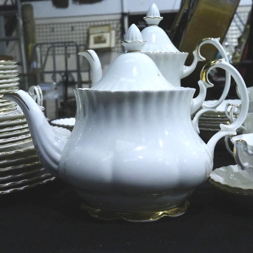 249 - Large quantity of Royal Albert Val D'Or pattern tea and dinnerware (44). Not available for in-house ... 