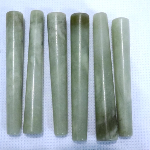 318 - Seven turned Chinese jade conical pillars, H: 58 mm. P&P Group 1 (£14+VAT for the first lot and £1+V... 