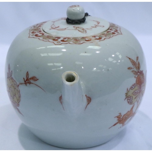 332 - Chinese ceramic teapot painted with pomegranates, H: 11 cm. Seven large chips to lid, handle has bee... 