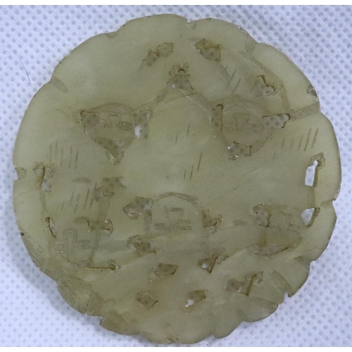 333 - Carved Chinese white jade pendant with naive carved faces to each side, D: 55 mm. P&P Group 1 (£14+V... 