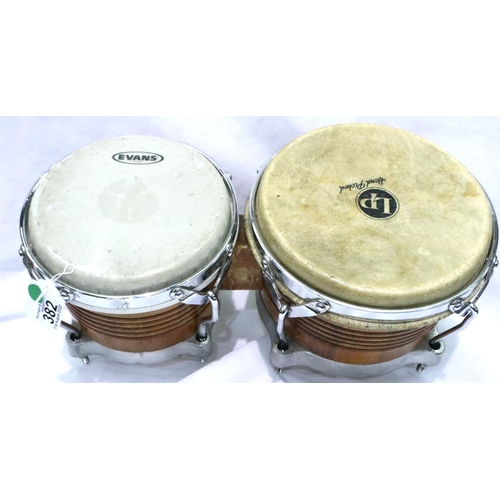 382 - Set of musical Bongo drums. P&P Group 3 (£25+VAT for the first lot and £5+VAT for subsequent lots)