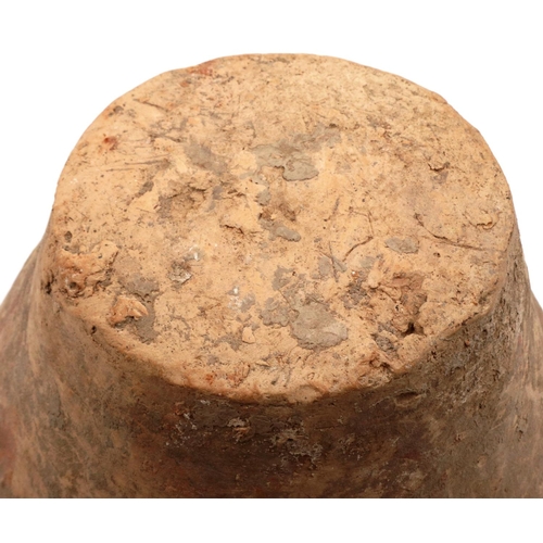 3001 - A Neolithic period terracotta vessel, with flared tubular neck and two loop handles; the upper body ... 