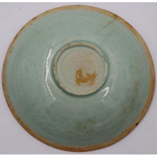 3015 - A rare Jin Dynasty celadon bowl, the interior decorated in relief with sprays of flowers and a geome... 