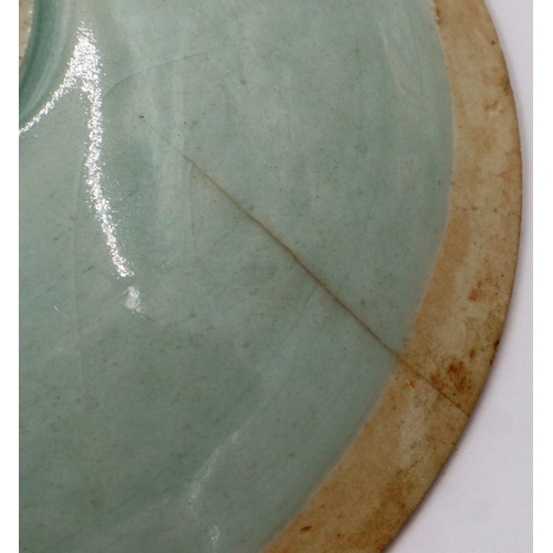 3015 - A rare Jin Dynasty celadon bowl, the interior decorated in relief with sprays of flowers and a geome... 