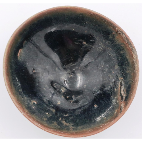 3016 - A Song Dynasty black glazed bowl, footed, D: 10 cm, H: 4 cm. P&P Group 2 (£18+VAT for the first lot ... 