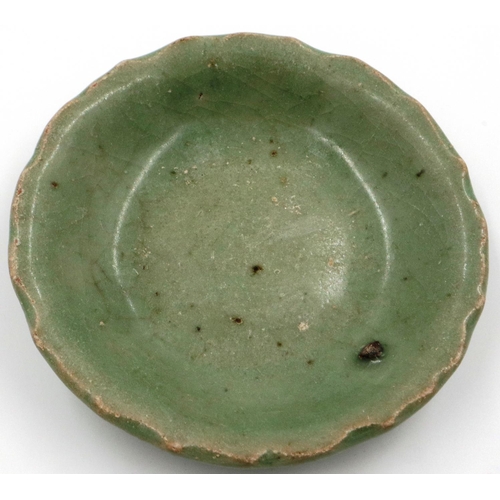 3020 - Ming Dynasty celadon shallow dish, having a wave border, imperfection beneath glaze, D: 13 cm. P&P G... 