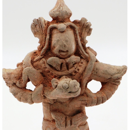 3021 - A Jian period terracotta figure of a Dragon God, possibly Sihai Longwang, standing atop a terrace, r... 