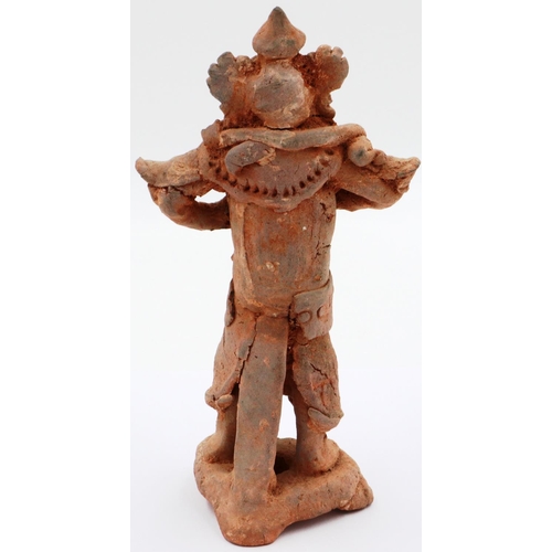 3021 - A Jian period terracotta figure of a Dragon God, possibly Sihai Longwang, standing atop a terrace, r... 