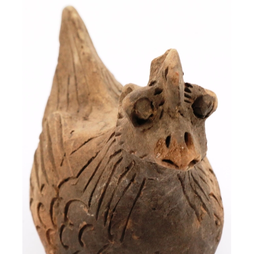 3022 - A Ming Dynasty zoomorphic clay rooster ornament, its features incised and applied, L: 13 cm, H: 11 c... 